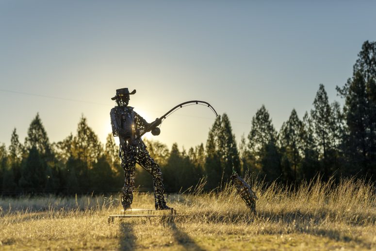 This statue created by local artist Dion Cross depicts two of the best things to experience in the Western Downs - fishing and culture.